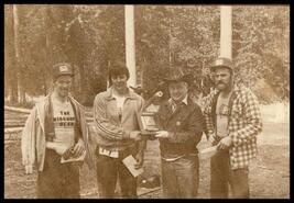 Four unidentified men with awards at Timber Days