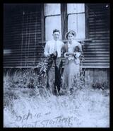 Sophie and Albert Stirling standing outside house