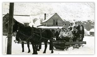 Young Peoples Club riding on a horse drawn sleigh