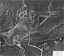 Aerial photograph of Revelstoke dam and city