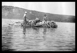 Survey crew crossing Beaver Lake while on a geographical survey of the area