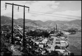 View of Trail from Lookout Mountain showing the smelter in the background and construction of the riverwall, 1950s