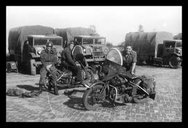 Motorcycles and transport trucks, W.W. II