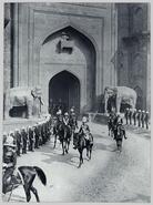 The King riding through the Delhi Gate