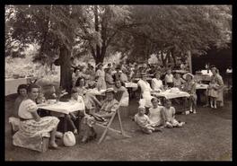 Women and children gathered for a picnic