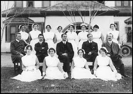 Vernon Jubilee Hospital staff in front of the hospital