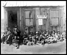 Workers outside he Johnston & Carswell sawmill office at the north end of Kalamalka Lake