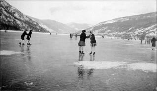 Children skating on Kootenay Lake