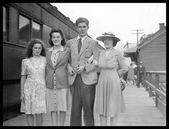 Betty Jane Fleming, unidentified girl, John Fleming and Betty Fleming at the Vernon C.P.R. train station