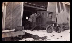 George Goulding with a farm truck