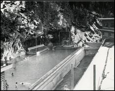 The 'hot pool' with swimmers in winter, Radium Hot Springs