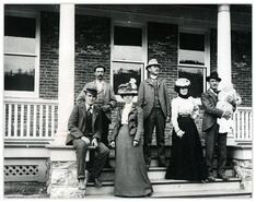 Group standing on the steps of the Granby assay office in Grand Forks, B.C.