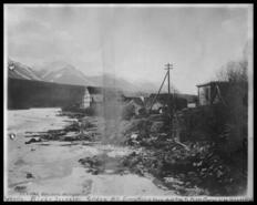 Kicking Horse River bank strewn with refuse
