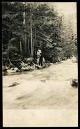 Unidentified people in the Little Slocan near Patrick's Lumber camp