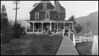 Aldridge home in Tadanac group on porch