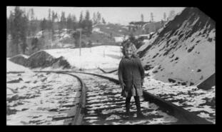 Young girl (Bertha) on railroad tracks