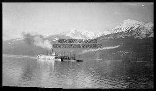 S.S. Slocan with barge