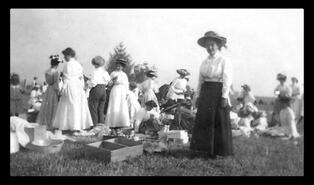 Ladies in country preparing for tea/picnic