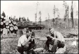 Jack Veale and Gus Brolin eating lunch at Indian Meadows logging camp