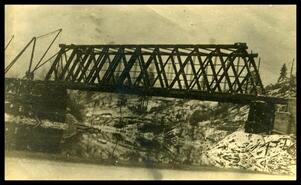 Postcard of construction of the train bridge at Grand Forks, B.C.