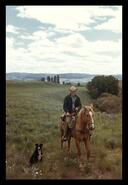 J. Miller on horseback at ranch
