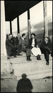 Gladys Pitts in group sitting on porch at Mountain Valley Ranch on Horsethief Creek