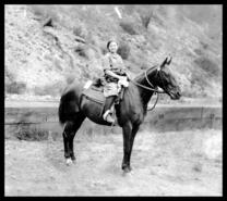 Agnes Cook on a horse