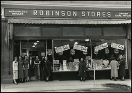 [Charles Wylie and employees at grand opening of Robinson Stores]