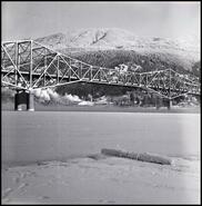 West Arm of Kootenay Lake frozen under bridge