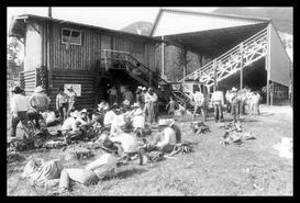 Cowboys resting outside ring of Falkland Stampede grounds