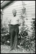 Dr. Harry Wishart Keith in his garden at Enderby, B.C.