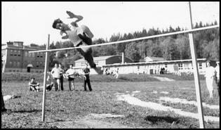 Alex Hawrys high jumping on Sports Day