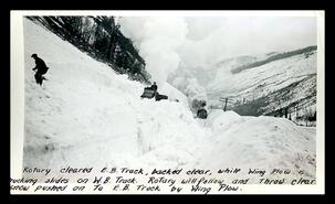 Plow clearing avalanche debris, Three Valley