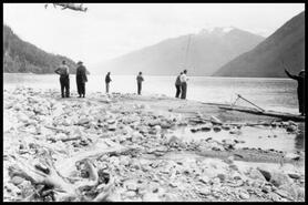 Group fishing from shore at Kinbasket Lake