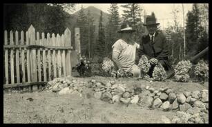 Mr. And Mrs. John D. Reid at Schoberg's grave, Slocan City