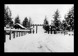 Road and timber gateway leading into New Denver Japanese internment camp