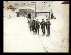 Men shovelling snow off mine rail line at Blakeburn, Coalmont