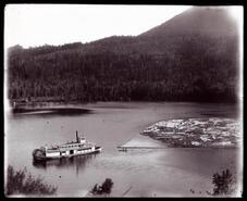 A.R. Helen towing a boom of logs on Adams Lake