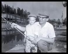 Al Jordon and son Randy at Polson Park fish pond