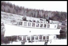 Mervil John Reid and Dave Fraser on the boat Nola at Brennan Creek