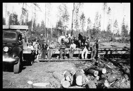 Logging crew and horses at unidentified road camp