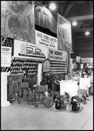 Industrial Exposition (1949) - Jack Fuhr Ltd. display of hydraulic pumps and chain saws