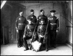 Members of Okanagan Mounted Rifles with their trophy