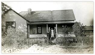 Mr. and Mrs. Stuart and two gentlemen callers on the front porch of the Stuart home