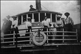 Group on the bridge of the S.S. Thompson on the Shuswap River