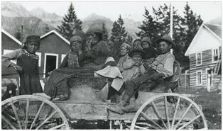 Indigenous family in wagon at Fairmont Hot Springs