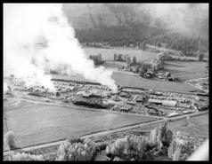 Aerial view of a sawmill and lumber yard near Lumby