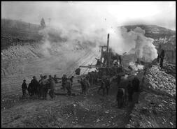 Railroad crew laying tracks for the Kettle Valley Railway