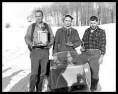 Winners with their trophies at the Merritt snowmobile races