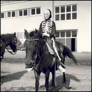 Costumed rider in 1958 parade